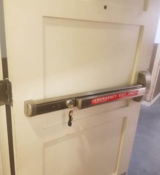 alarmed-panic-bar-installation-commercial-door-waco-img Alarmed panic bar installation in Waco, TX on a commercial door