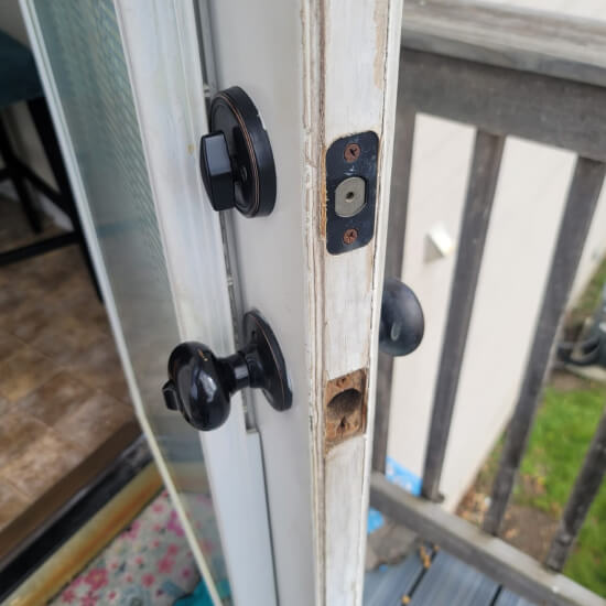 dallas-locksmith-installing-deadbolt-home-door-img Dallas locksmith installing a deadbolt on home door