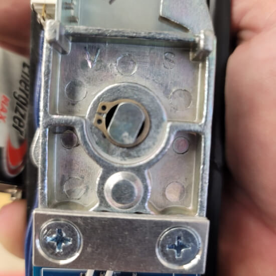 dallas-locksmith-repairing-electronic-door-lock-img Locksmith in Dallas repairing an electronic door lock