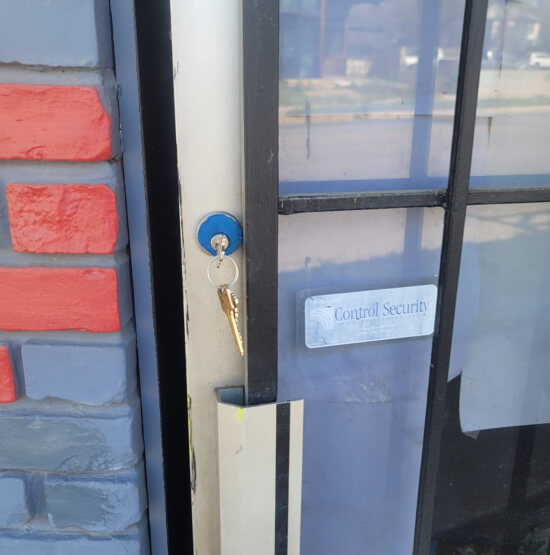 waco-locksmith-rekeying-glass-door-lock-img Waco locksmith rekeying a glass door lock