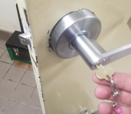commercial-locksmith-opening-business-door-san-marcos-tx-img Commercial locksmith opening a business door in San Marcos, TX