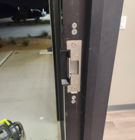 electric-strike-dallas-commercial-storefront-door-img Electric strike installed on a Dallas commercial storefront door