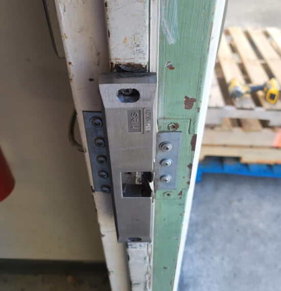 Electric strike installation on a Waco commercial door frame